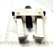Outil de retrait de suspension