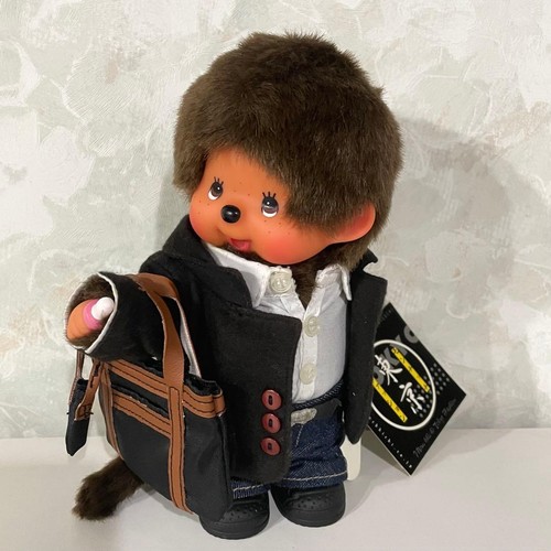 Figurine poupée peluche veste