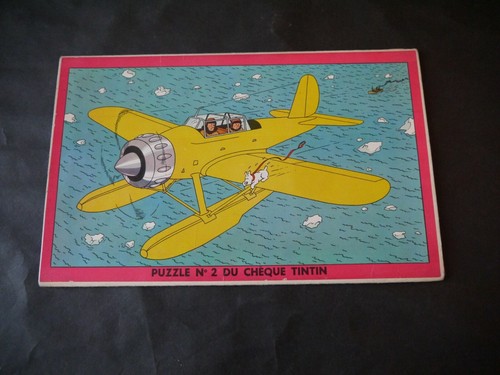 Herge puzzle du cheque - herge,
