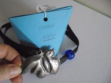 Authentique pendentif oiseau