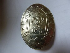 Badge de service,  plaque de