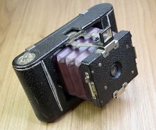 appareil photo pliant Emile WÜNSCHE modèle NYMPHE 1899/1902 soufflet rouge 6x8.5