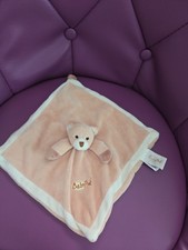 Doudou ours plat BABY'NAT BABYNAT brun marron beige bras yeux durs 