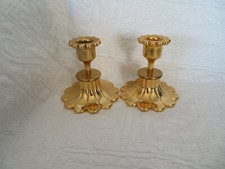 2 bougeoirs en métal doré