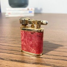 Briquet lift-arm vintage 1950 en laiton doré et gainage rouge marbré