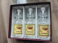 3 Mignonnettes vides de liqueur différente dans leur boite, produits de France
