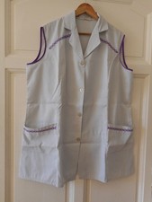 Blouse nylon dame T.50. Couleur blanc cassé.