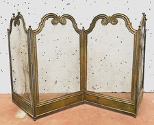 pare feu de cheminée quatre feuilles en bronze et maille de fer doré .XX siècle.