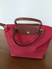 Sac Longchamp rouge brique le pliage type S