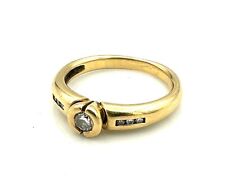 MAGNIFIQUE BAGUE OR 18 CARATS - Solitaire serti clos 0,15 carat - 3,93 g