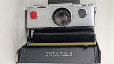 POLAROID SX-70 Land Camera Deiuxe pour pièces détachées # Non fonctionnel #