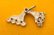 34) ROLLER SKATES 1,0 g - 1,2