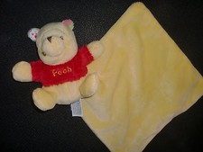 Doudou Winnie jaune mouchoir oreilles de couleur DISNEY