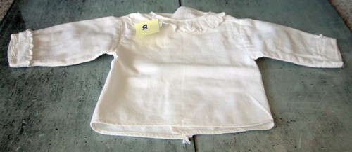 Ancienne brassière bébé