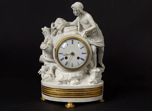 Pendule biscuit personnage