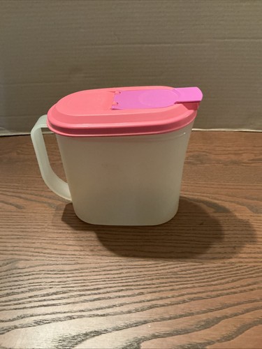 Tupperware store pour - &,