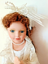 Poupée porcelaine communiante