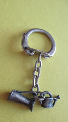 Porte clé métal années - , 60