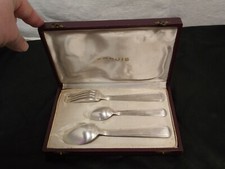 Couverts de baptême en métal