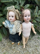 2 Poupées mignonnettes tête