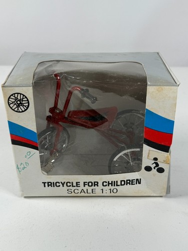 Vintage red metal tricycle - red,