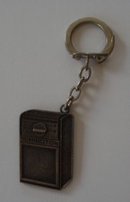 PORTE CLE METAL RASOIRS ELECTRIQUES REMINGTON.