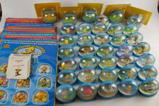 Lot 36 Boules de neige Titi (Disney) Pays Découvre Le Monde Bon état