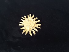 Magnifique broche  soleil LOOLA PARIS