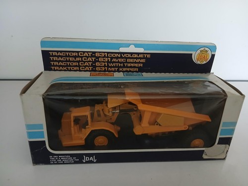 Tracteur avec benne cat 631 - tracteur,