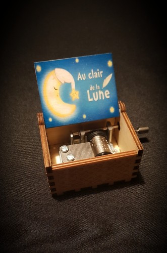 Boîte musique bois au - à,