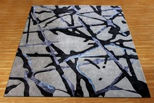 Tapis touffetés à la main