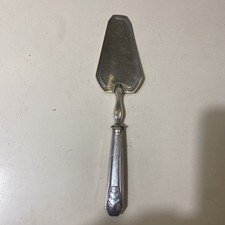 Pelle a tarte à gâteau ancienne en métal argenté art deco