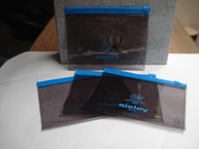 Lot de 4 trousses pochettes transparentes et bleues SISLEY (17.5x4cm)