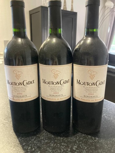 Vin bouteilles mouton cadet - en,