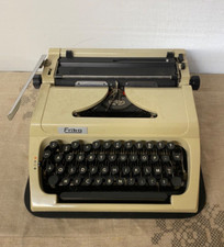 Machine à écrire fonctionne de marque erika en bonne état vintage ancien