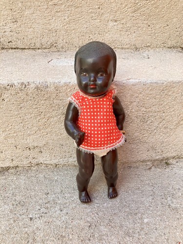Ancien petit poupon noir