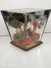 A Japanese  Doll In Glass Case 