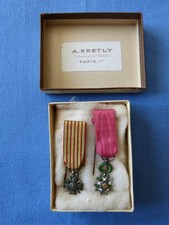 Deux médailles miniature dans boite d'origine