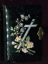 Gorgeous black bakelite missal with flower and cross incision