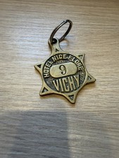 Ancien porte-clé d’hôtel