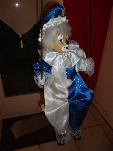Poupee clown porcelaine - de, sur