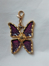 Pendentif  ou bijoux de sac Yves Saint Laurent Papillon