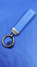 1 Porte clé AMG Mercedes LOGO Neuf sous blister cuir Alcantara Bleu 