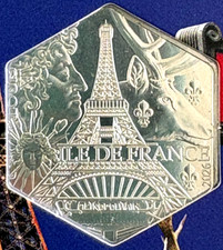 Pièce argent hexagonale - en,