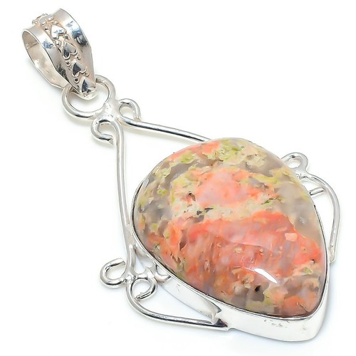 Pendentif bijou ancien fait