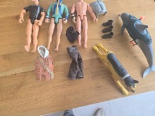 lot action man avec chien et dauphin