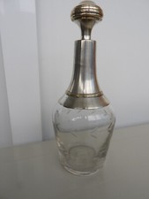ANCIENNE CARAFE A LIQUEUR EN CRISTAL ET METAL ARGENTE MEISENTHAL SAINT LOUIS ?