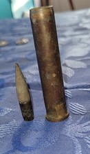 ANCIENNE BALLE ET UNE DOUILLE,JE NE SAIS PAS L'ORIGINE,PETITE 4CM,+GRANDE 7X1,5C
