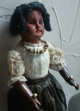 Poupée tête porcelaine créole métis SFBJ moule 6/0  tenue complète début XXème