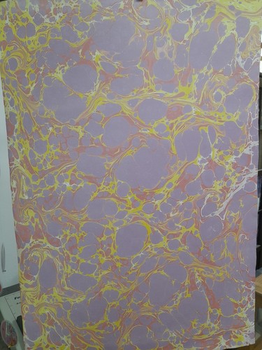 Papier marbré cuve de - à,